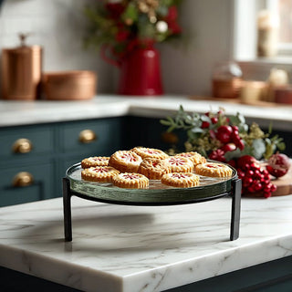 Glass pedestal stand with cookies in kitchen décor