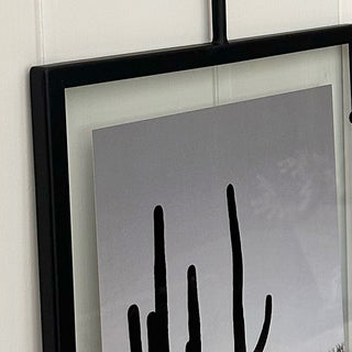 Close-up black metal picture frame corner