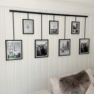 Wall-mounted hanging gallery frames display