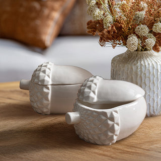 White porcelain acorn-shaped decorative containers