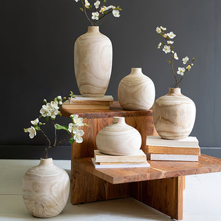 Set of five natural wooden vases