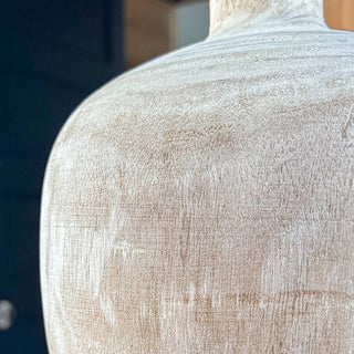 Detailed texture of handcrafted natural wood vase