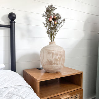 Large round wooden vase with dried flowers