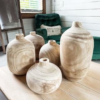 Rustic set of five natural wood vases