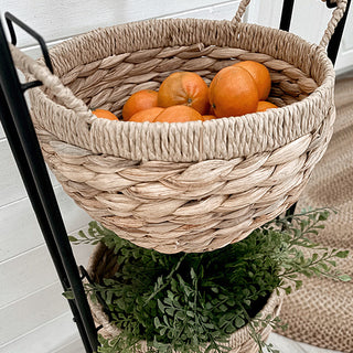 Woven basket holding fruit kitchen storage solution