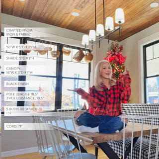 Farmhouse dining chandelier over wood table Christmas decor