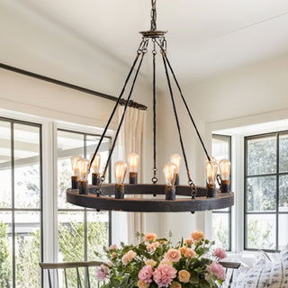 Rustic iron chandelier styled in bright dining room