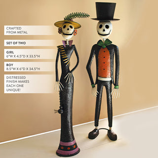 Set of two metal skeleton figurines