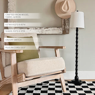 Black wooden floor lamp with white fabric shade