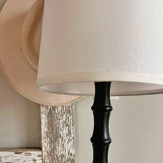 White fabric lampshade with black farmhouse lamp stem