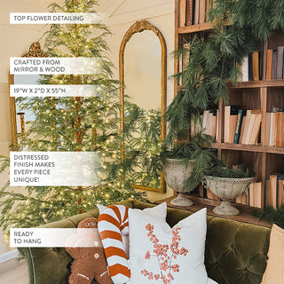 Vintage arched mirror with floral detailing living room