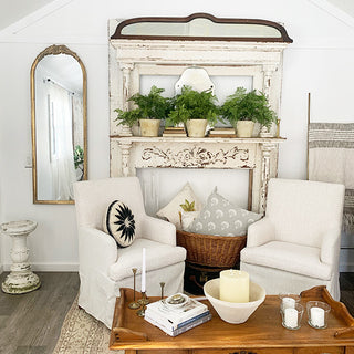 Cozy farmhouse seating area with arched mirror