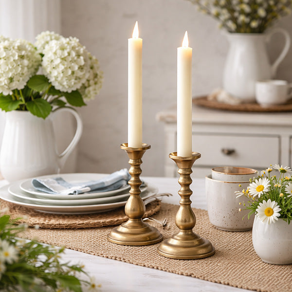 Brass taper candle holders with flameless candles centerpiece