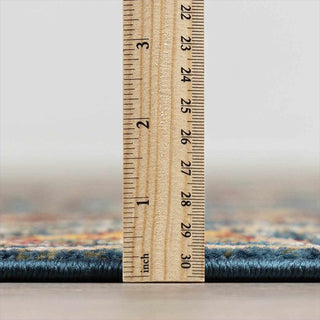 Wooden ruler measuring a thread on a blurred background