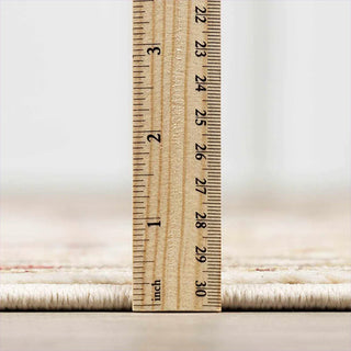 Wooden ruler on a textured fabric background