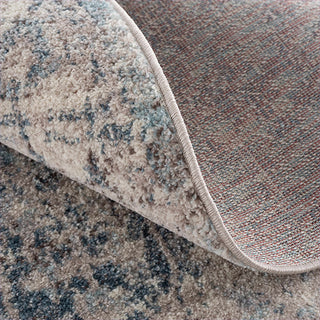 Close-up of a textured rug with a neutral color palette