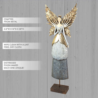 Painted metal angel figurine with gold leaf wings on a stand, shown against a neutral wood background with product details for size, materials, and distressed finish