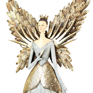 Close-up of decorative painted metal angel figurine highlighting gold textured wings and a distressed crown for holiday home décor