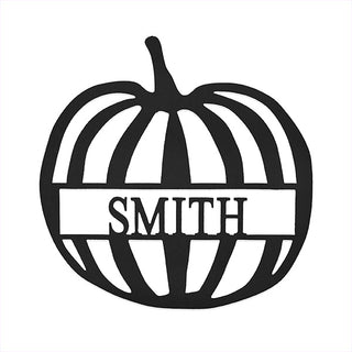 Personalized pumpkin-shaped metal wall sign with “Smith” name for fall and Halloween decor