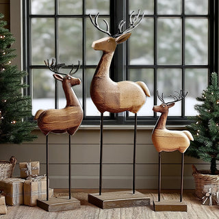 Carved Wood and Iron Reindeer on Bases, Set of Three