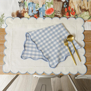 Blue scalloped placemat with matching gingham napkin