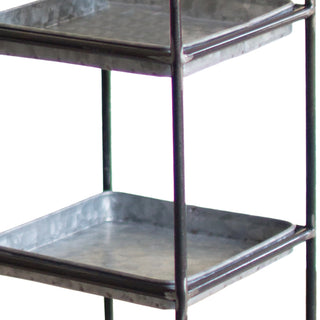 Close-up of galvanized metal tiered tray shelf