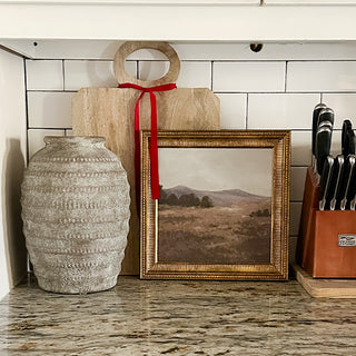 Rustic ceramic vase styled on kitchen countertop decor