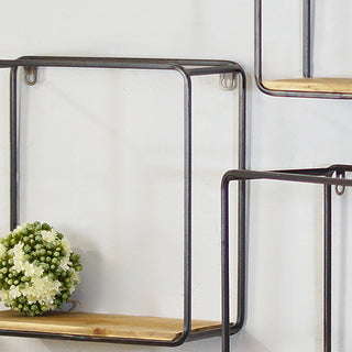 Industrial metal wood floating wall shelf close-up