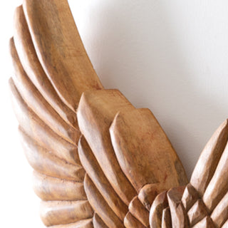 Wooden wing wall art feather detail closeup