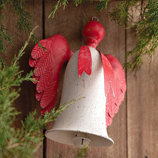 Heavenly angel bell ornament featuring hand-formed textured metal wings and distressed white paint finish with red decorative elements