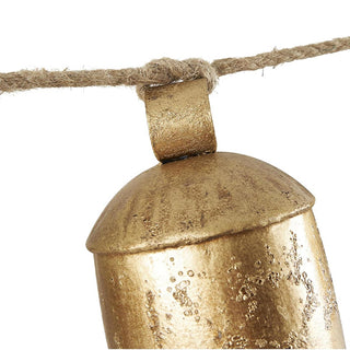 Rustic metal bell string decoration with antiqued gold finish on natural rope