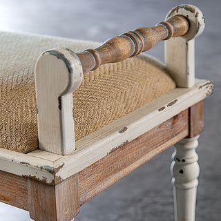 Close-up of distressed bench armrest detail