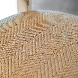 Textured herringbone fabric bench cushion close-up
