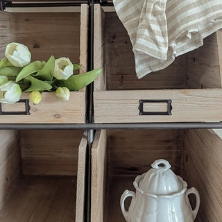Natural wood storage cubby detail with label holder