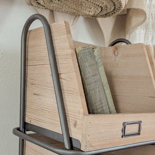 Rustic wooden cubby shelf with vintage book display