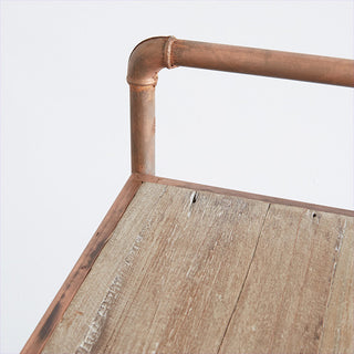 Close-up distressed copper shelf corner detail