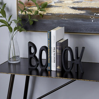 Modern black bookends on console table