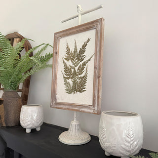 Pressed fern framed art styled on shelf decor