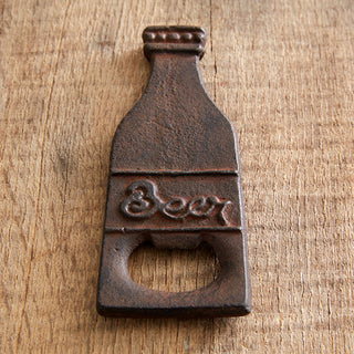 Cast iron beer shaped bottle opener with embossed text detail