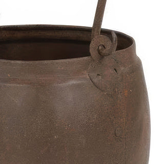 Close-up distressed metal bucket with rustic texture