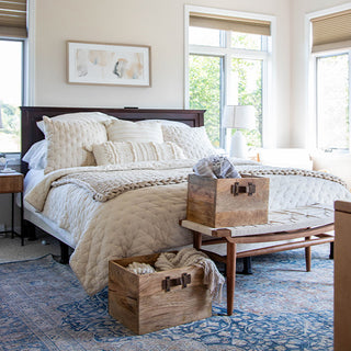 Rustic wooden storage crates in cozy bedroom decor