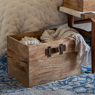 Rustic wood crate blanket storage bedroom styling