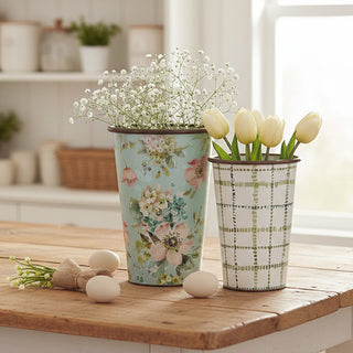 Floral metal vase with spring flowers on farmhouse table