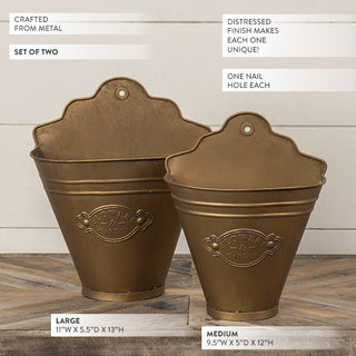  Set of two distressed gold Flowers and Garden wall bucket planters showing large 11x5.5x13 and medium 9.5x5x12 dimensions