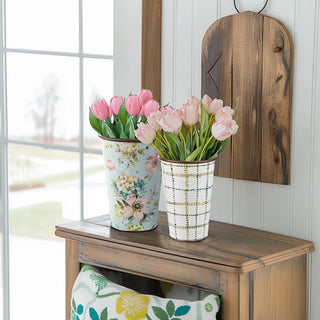 Farmhouse vases with tulips on rustic wood cabinet