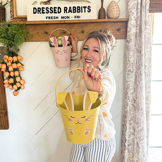Woman holding bunny Easter bucket farmhouse decor

