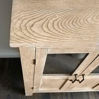 Natural wood grain detail on solid wood sideboard