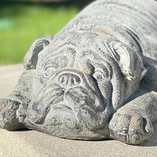 Close-up bulldog statue rustic garden decor detail