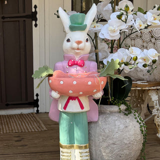 Pastel Easter bunny statue with decorative bowl
