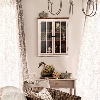 Wall-mounted distressed farmhouse cabinet